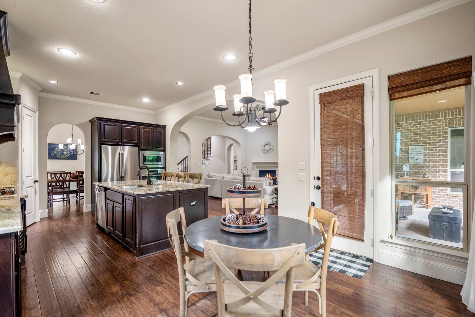 The thoughtful design makes the flow between kitchen, dining, living, and outdoors seamless.