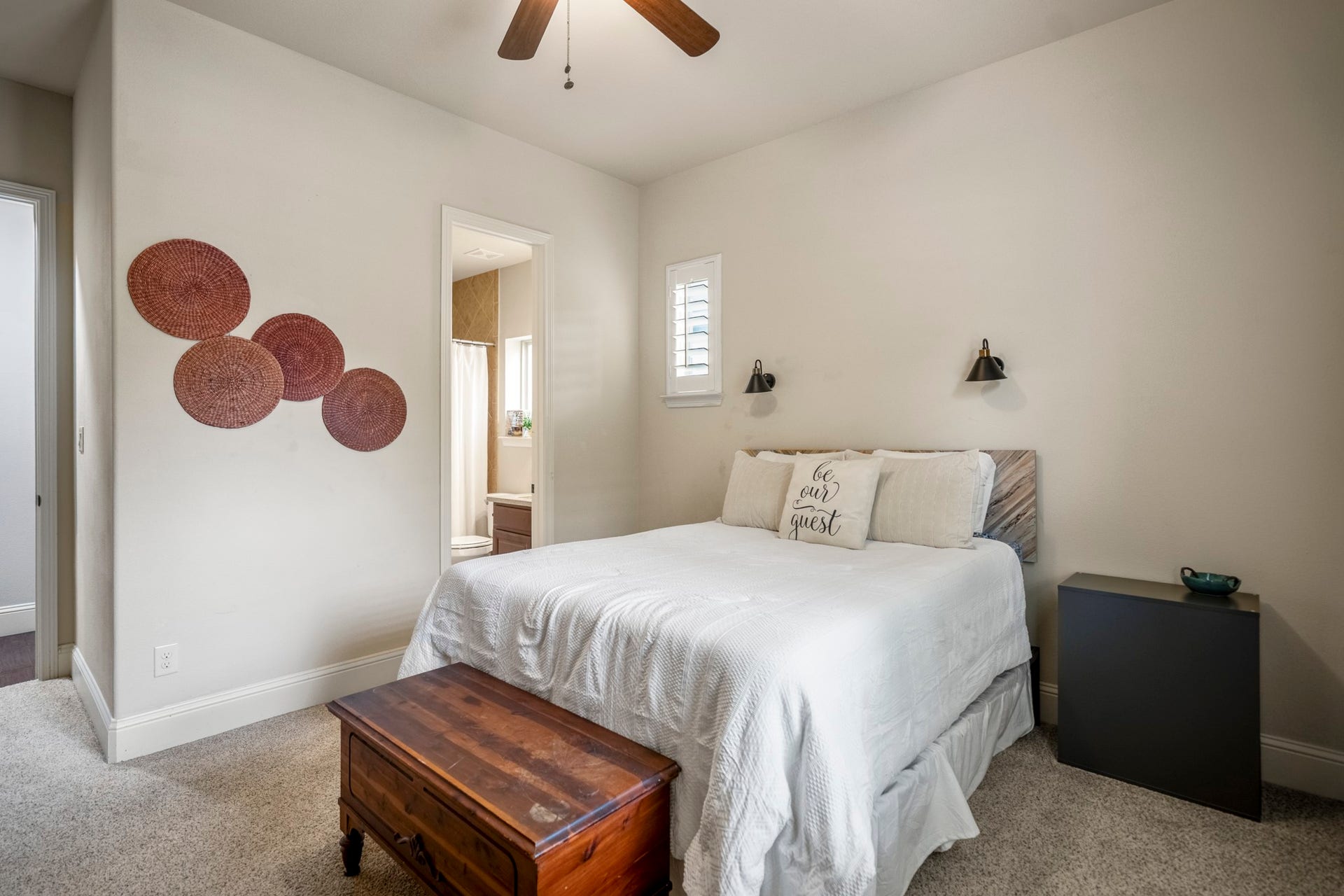 Secondary bedroom with a full bath.