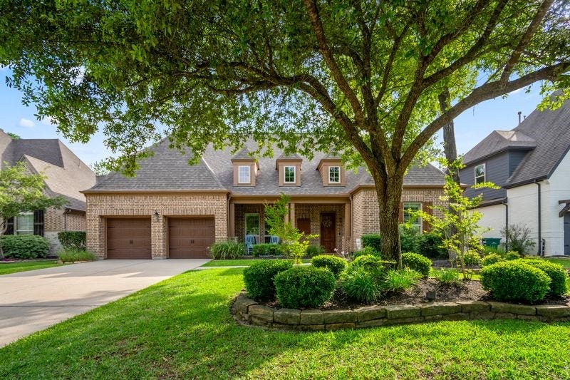 Listed just in time for a summer move in, 138 Monterrey Bend offers timeless charm in the heart of Woodforest and the Spyglass community.