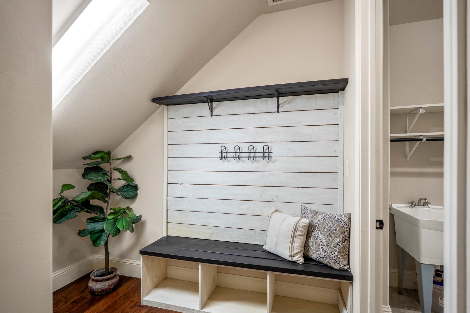 The mudroom is designed for everyday convenience and functionality.