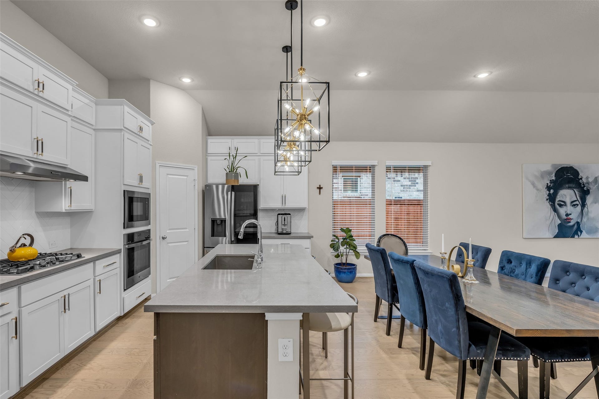Cook on the gas cooktop, with built-in oven and the pantry close at hand.