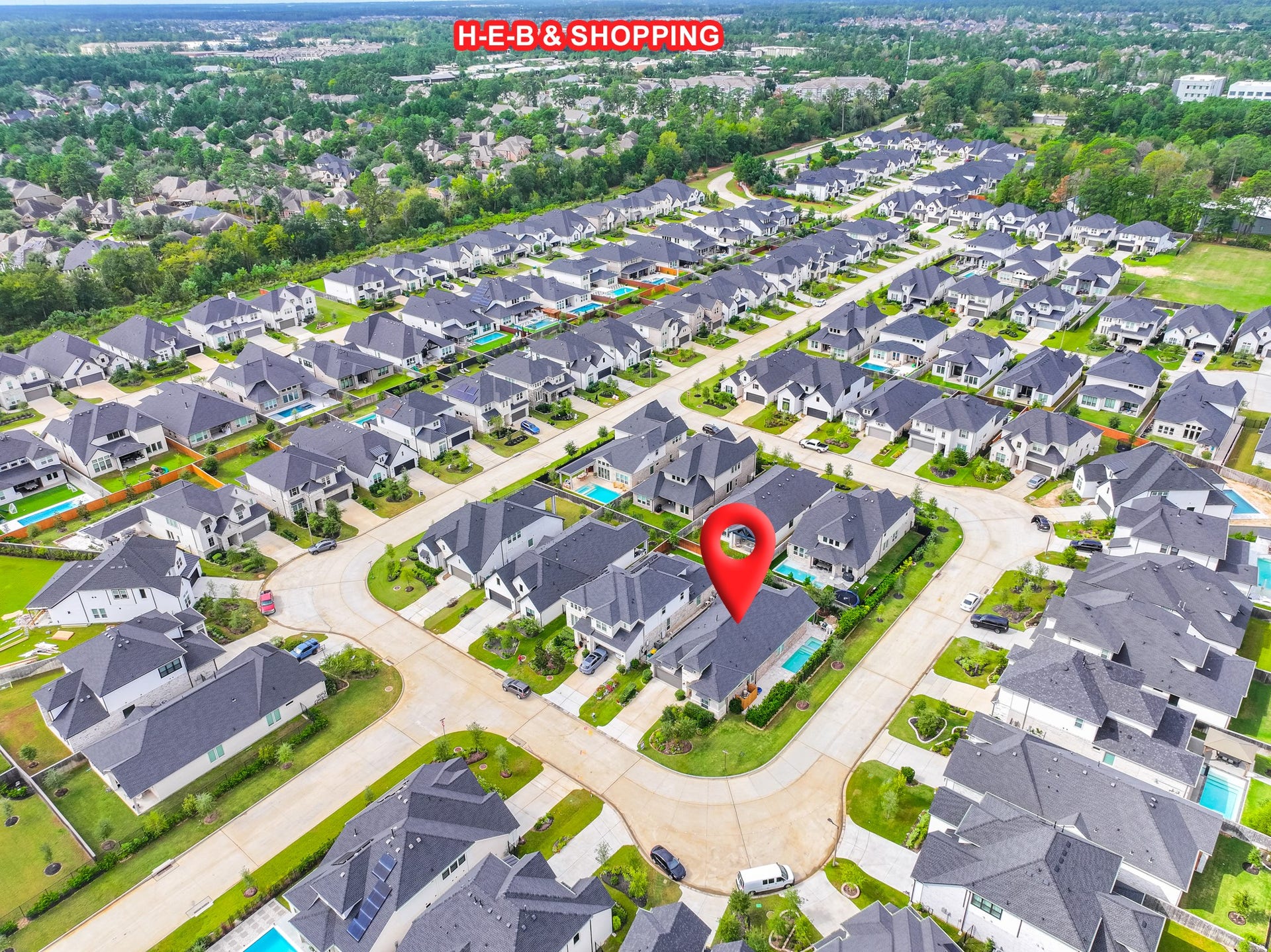 Aerial view locating the home within its established Spring neighborhood, just minutes from The Woodlands with quick access to the Grand Parkway, everyday shopping, dining and area parks.