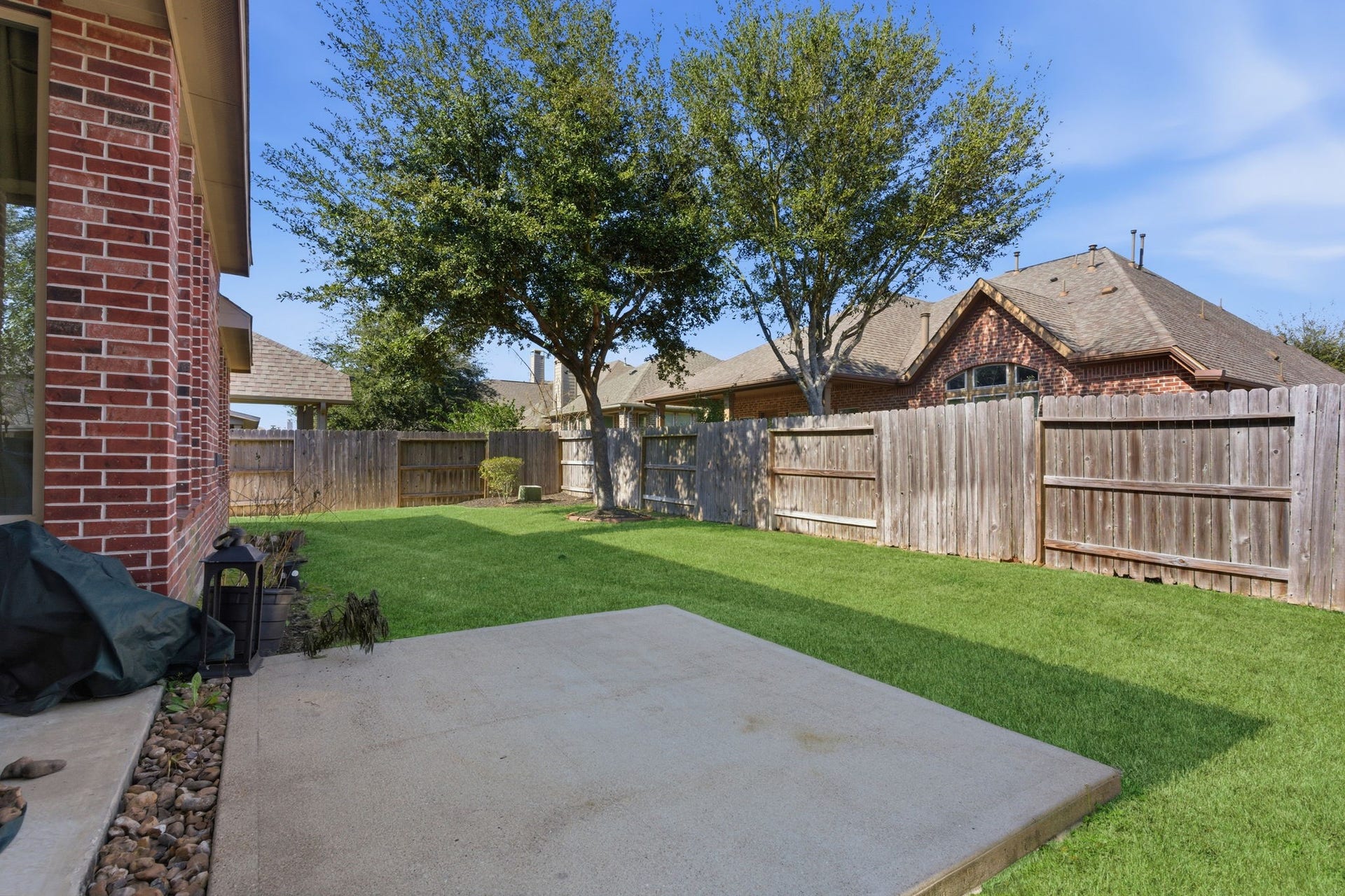 Corner cul-de-sac lot makes for a large back yard perfect for outdoor activities and and summer nights on the grill