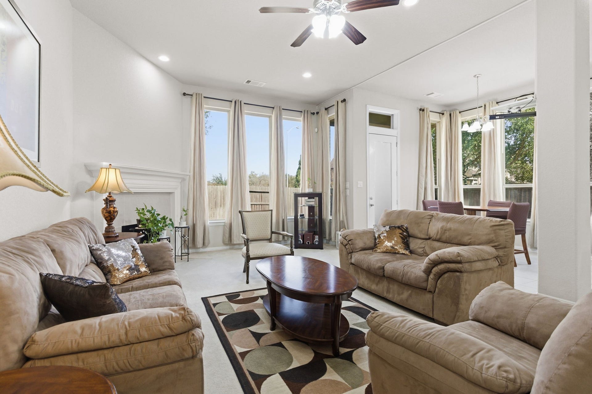 Open concept surrounded by large windows bring in beautiful natural light.