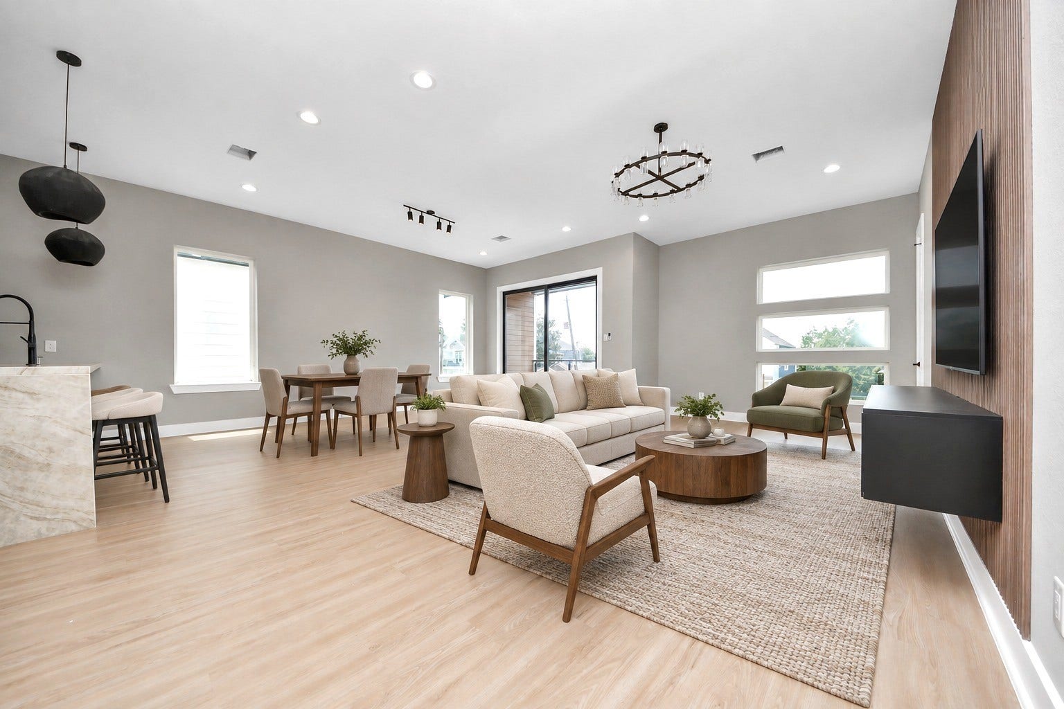 Unit Cs light-filled open concept brings the living, dining and kitchen areas together beautifully.