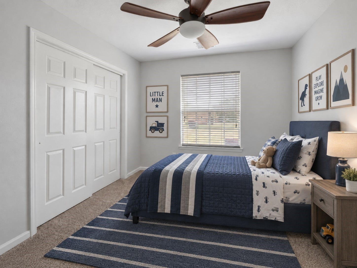 4933 1/2 Powers Ln, Alvin, TX 77511 Third bedroom (virtually staged) with an upgraded ceiling fan and views of the backyard.