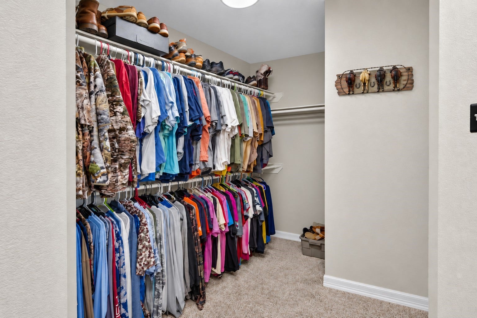 4933 1/2 Powers Ln, Alvin, TX 77511 Oversized walk-in closet in the primary suite offers an abundance of storage and hanging space.