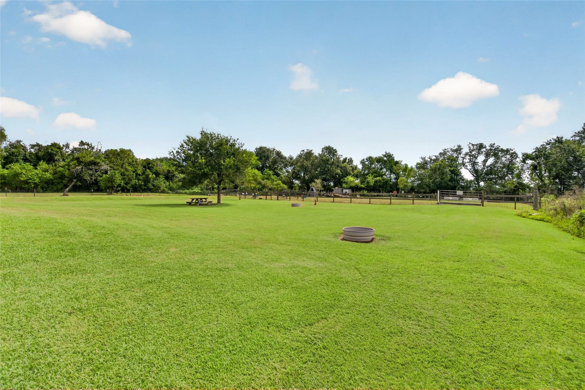 4933 1/2 Powers Ln, Alvin, TX 77511 Expansive backyard offers plenty of room for a future in-ground pool, additional shop, or other outdoor improvements.
