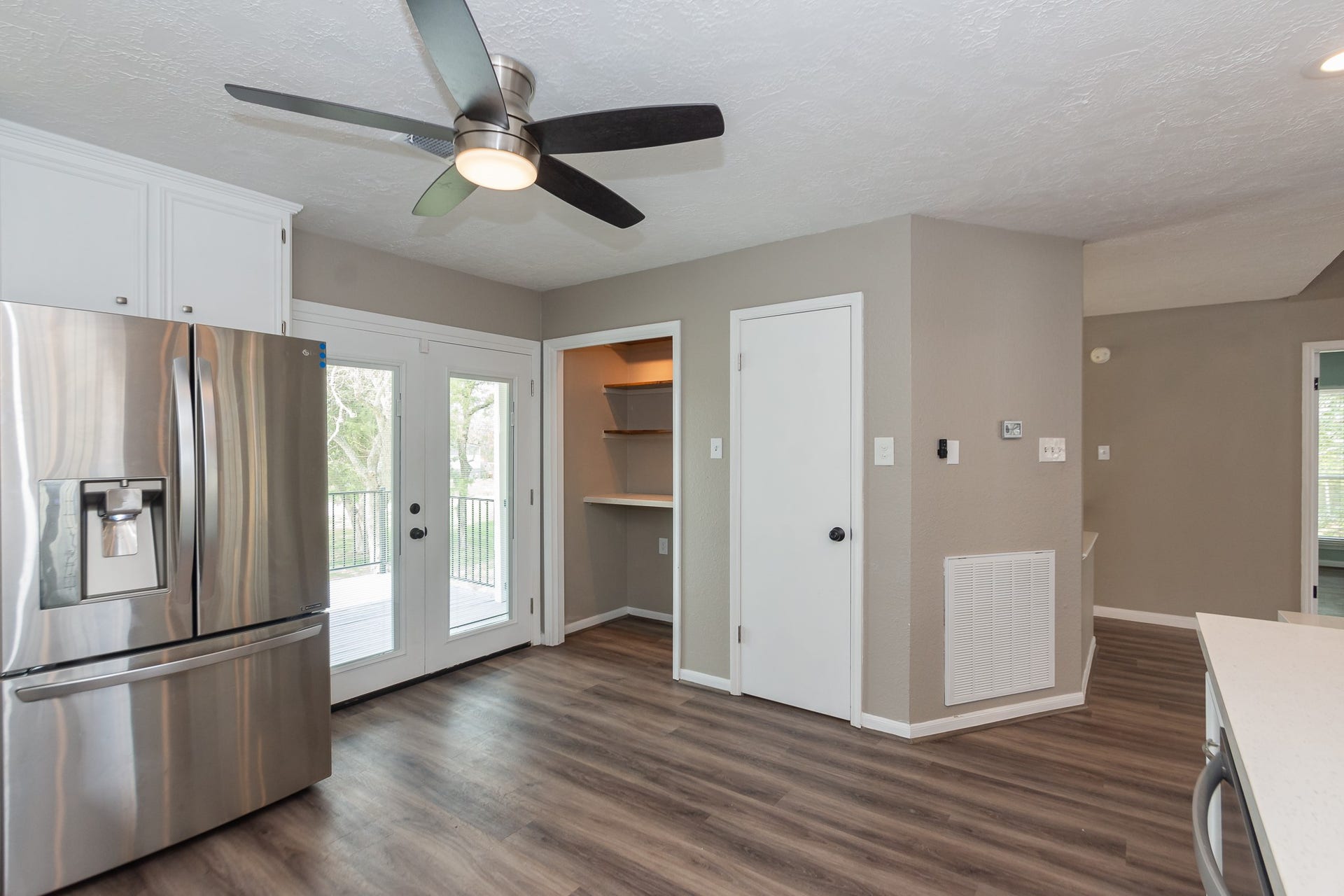 4509 Country Club Drive, Dickinson, TX 77539 A lighted built-in shelving nook makes the perfect coffee station or dry bar, adding both charm and functionality. Next to it, youll find a full pantry closet for extra storage.