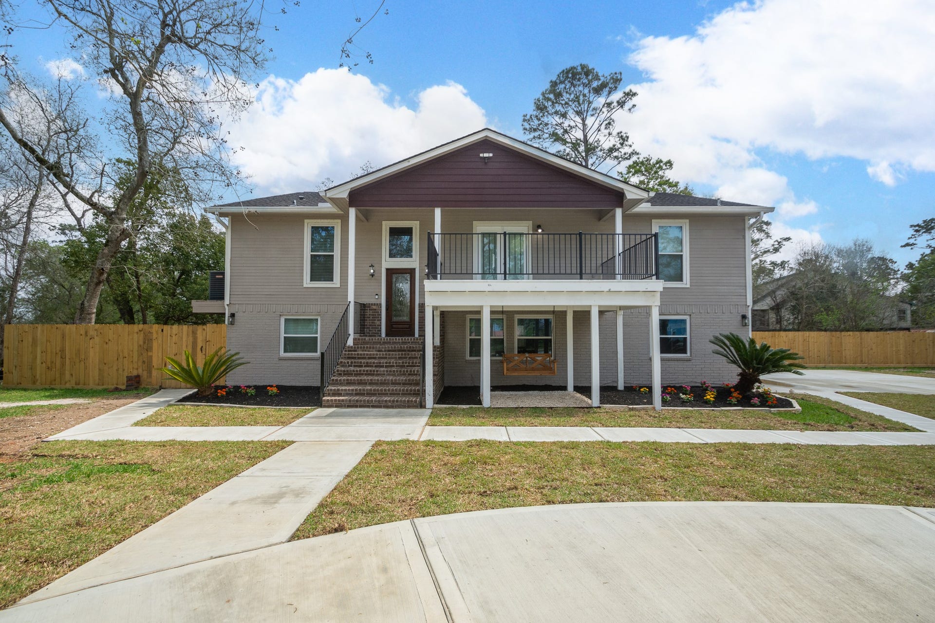 4509 Country Club Drive, Dickinson, TX 77539 Freshly built brick stairs leading up to the lead glass front door.