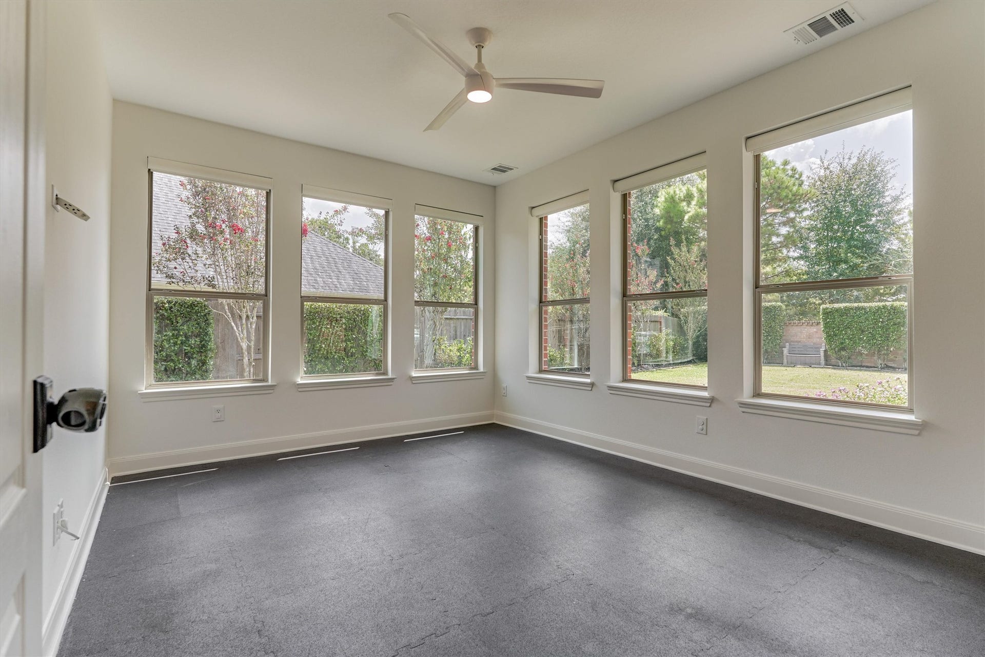 13819 Majestic Spring Lane, Humble, TX 77396 Sunroom used as a home gym