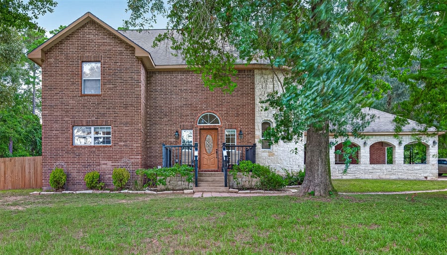 Property photo for 11232 Kentucky Oaks Drive, Conroe, TX