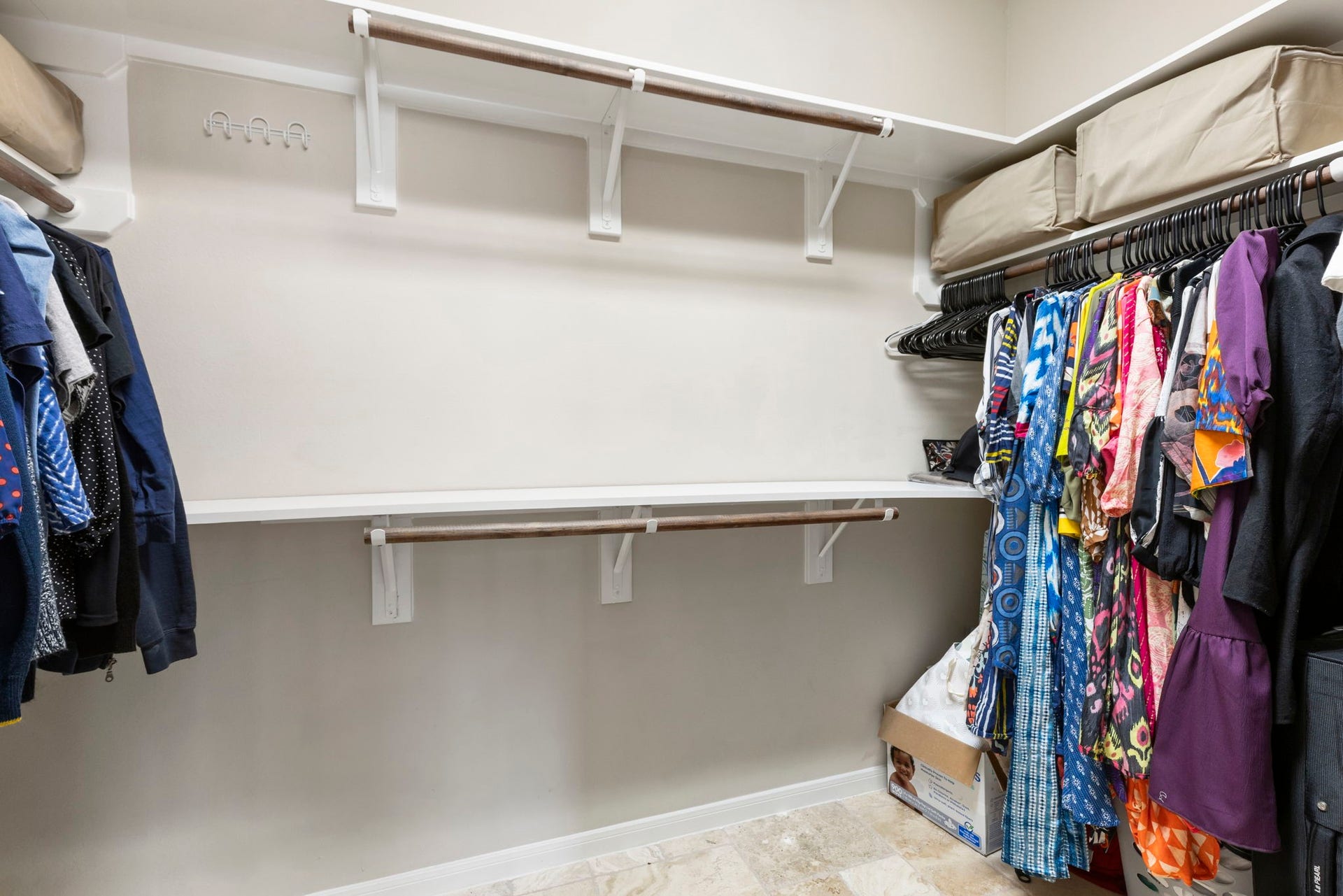 14 N Bardsbrook Circle, The Woodlands, TX 77382 Expansive second primary closet featuring abundant hanging space and storage options.