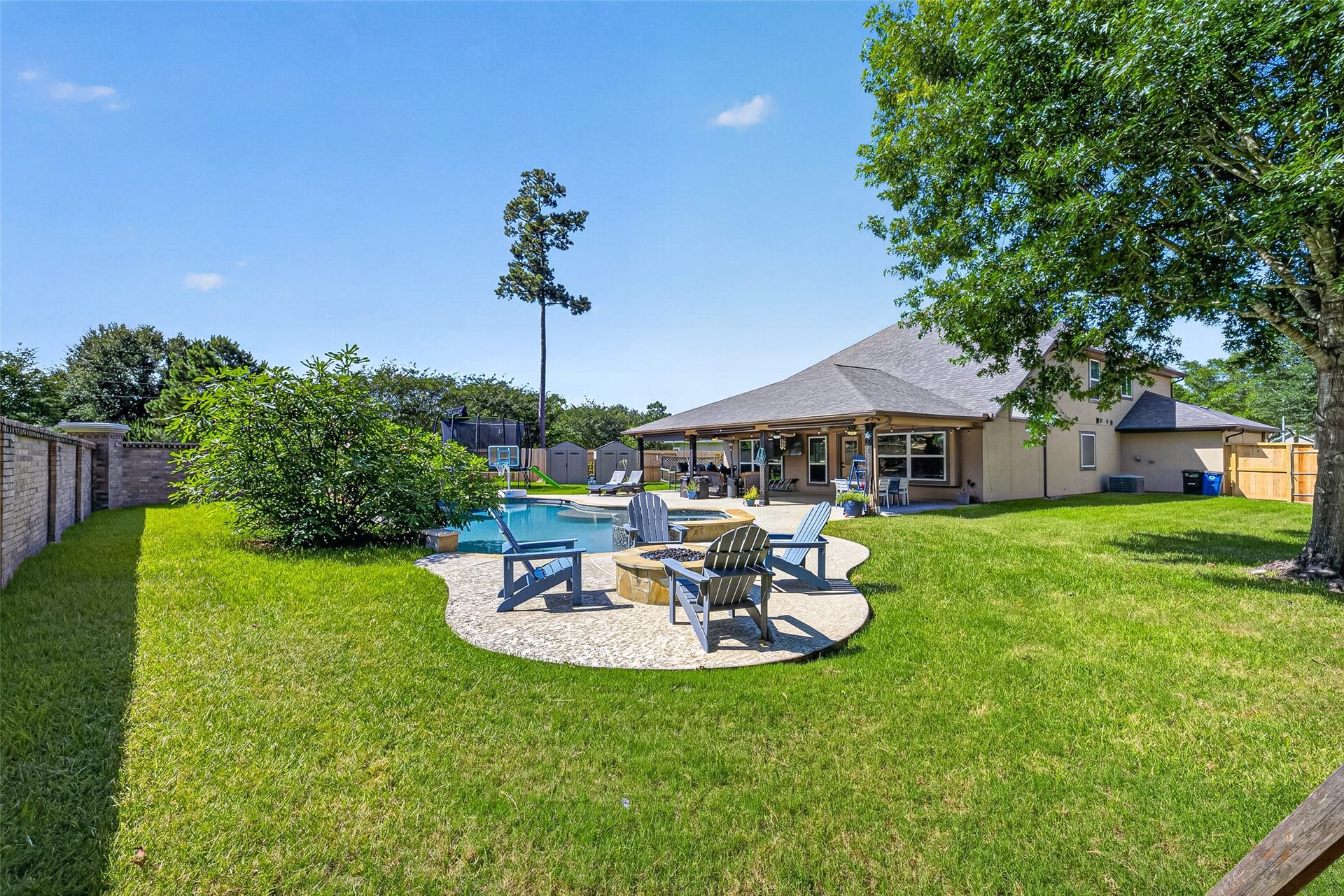 14303 Fosters Run Lane, Humble, TX 77396 The premium lot is a rare find and is set up perfect for a quiet evening at home or inviting friends and family for backyard fun.