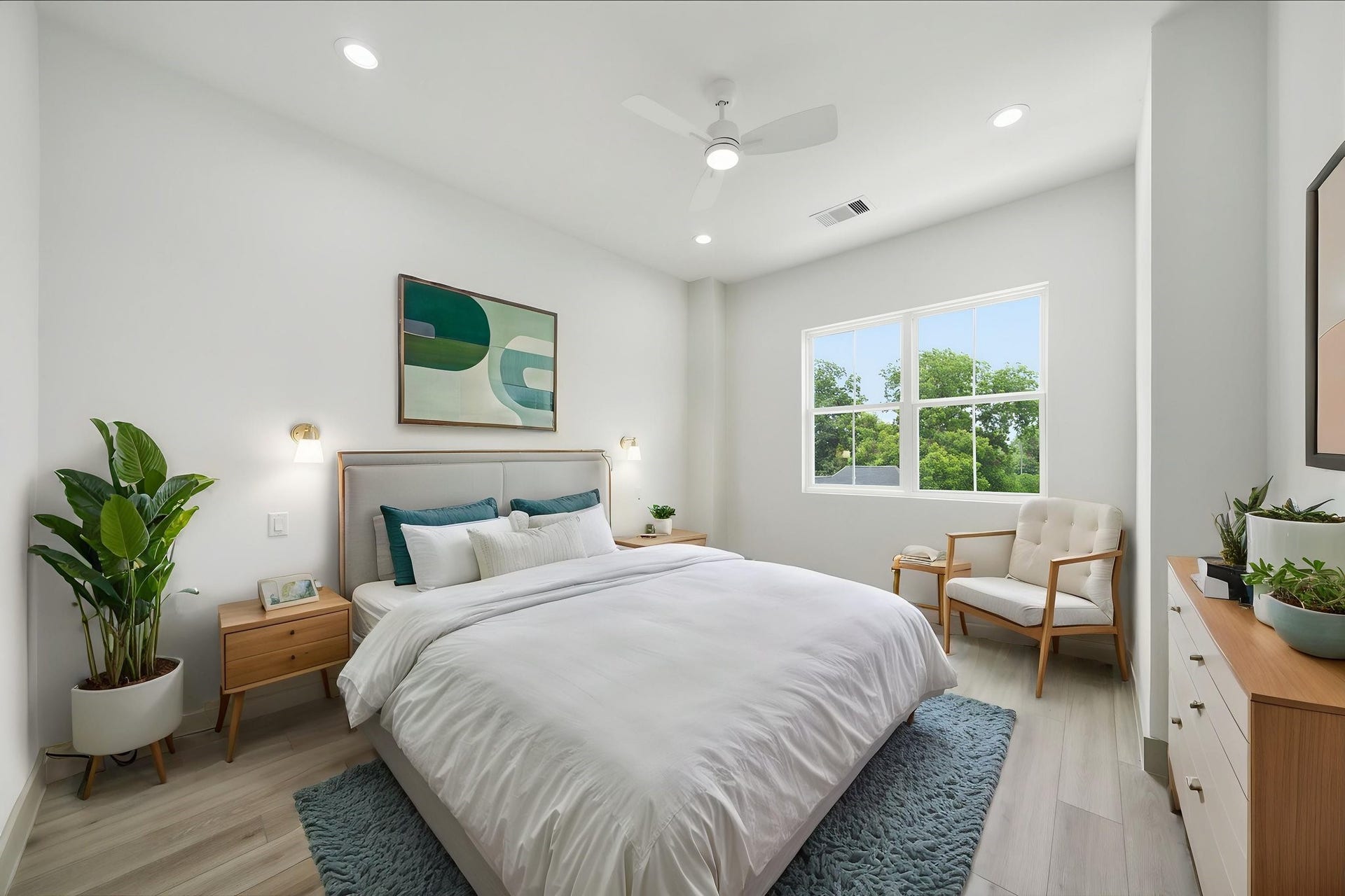 1116 Weiss Street, Houston, TX 77009 Virtually staged - Primary bedroom with tall 11' ceilings (and 11' throughout the home!). NO CARPET in this home! Note the bedside sconces pre-wired by the headboard!
