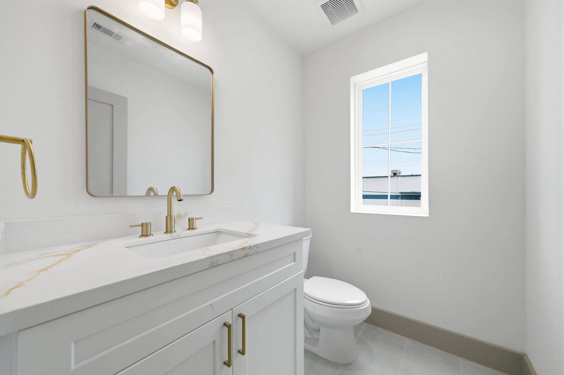 1116 Weiss Street, Houston, TX 77009 The half bath is close by to the entertainment space, yet provides plenty of privacy