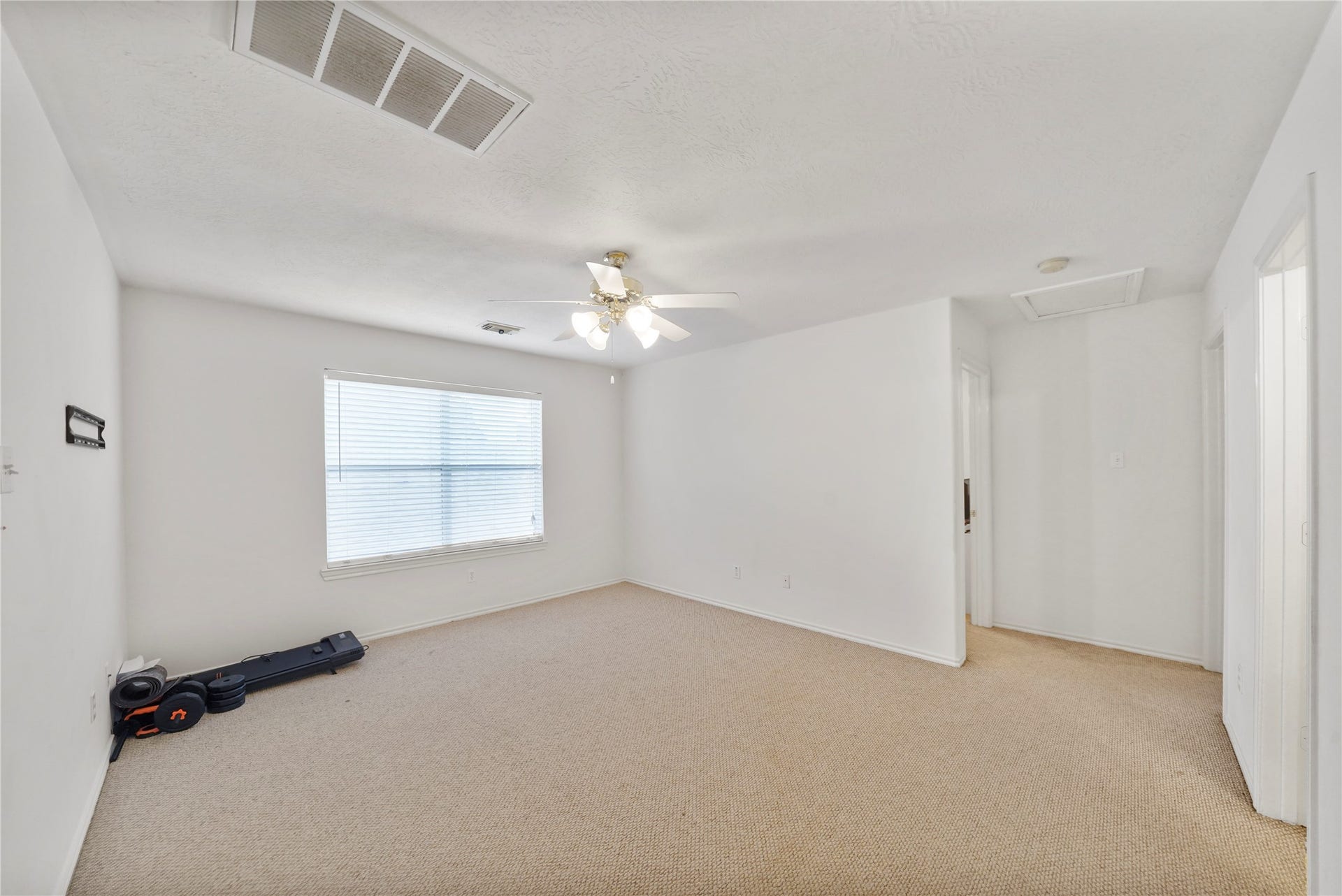 5614 Gaffney Lane, Houston, TX 77084 The upstairs game room creates a true second living area, ready for movie nights, hobbies, homework, or a relaxed lounge away from the main level.