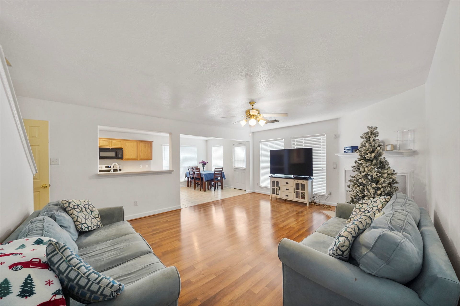 5614 Gaffney Lane, Houston, TX 77084 From this angle, the openness between the family room and kitchen comes into view, making the main level feel connected while still giving each space its own purpose.