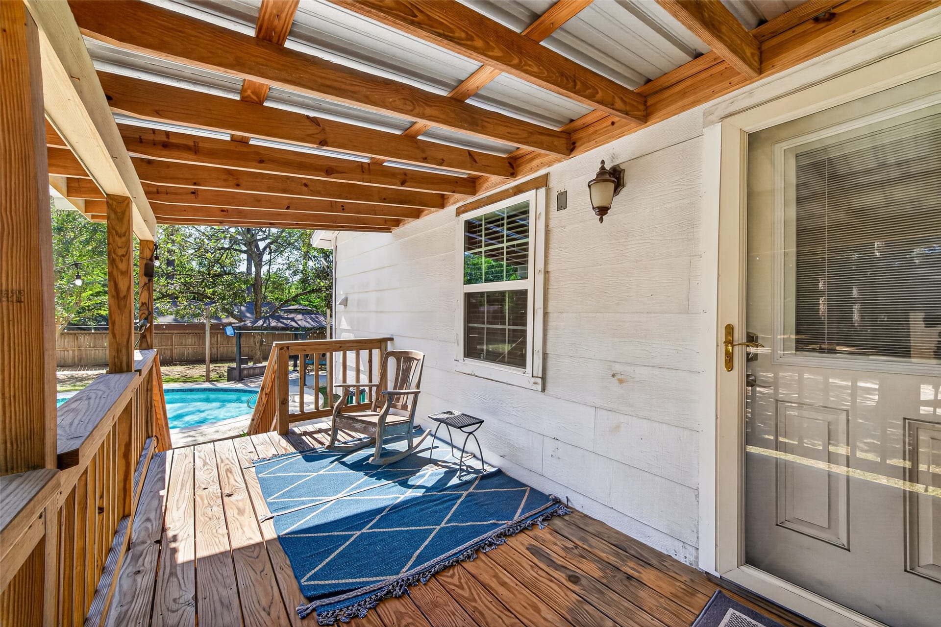 1535 Memorial Drive, Conroe, TX 77304 WELCOME TO THE POOL HOUSE! THIS CAN BE A GAME ROOM, MAN CAVE OR ADDITIONAL LIVING SPACE FOR FAMILY OR FRIENDS; UPDATES INCLUDE: NEW LOW-E WINDOWS, GLASS ENTRY DOOR, NEW FRONT DOOR WITH WINDOW BLIND ENCLOSURE AND A SPACIOUS COVERED PORCH WITH A METAL ROOF.