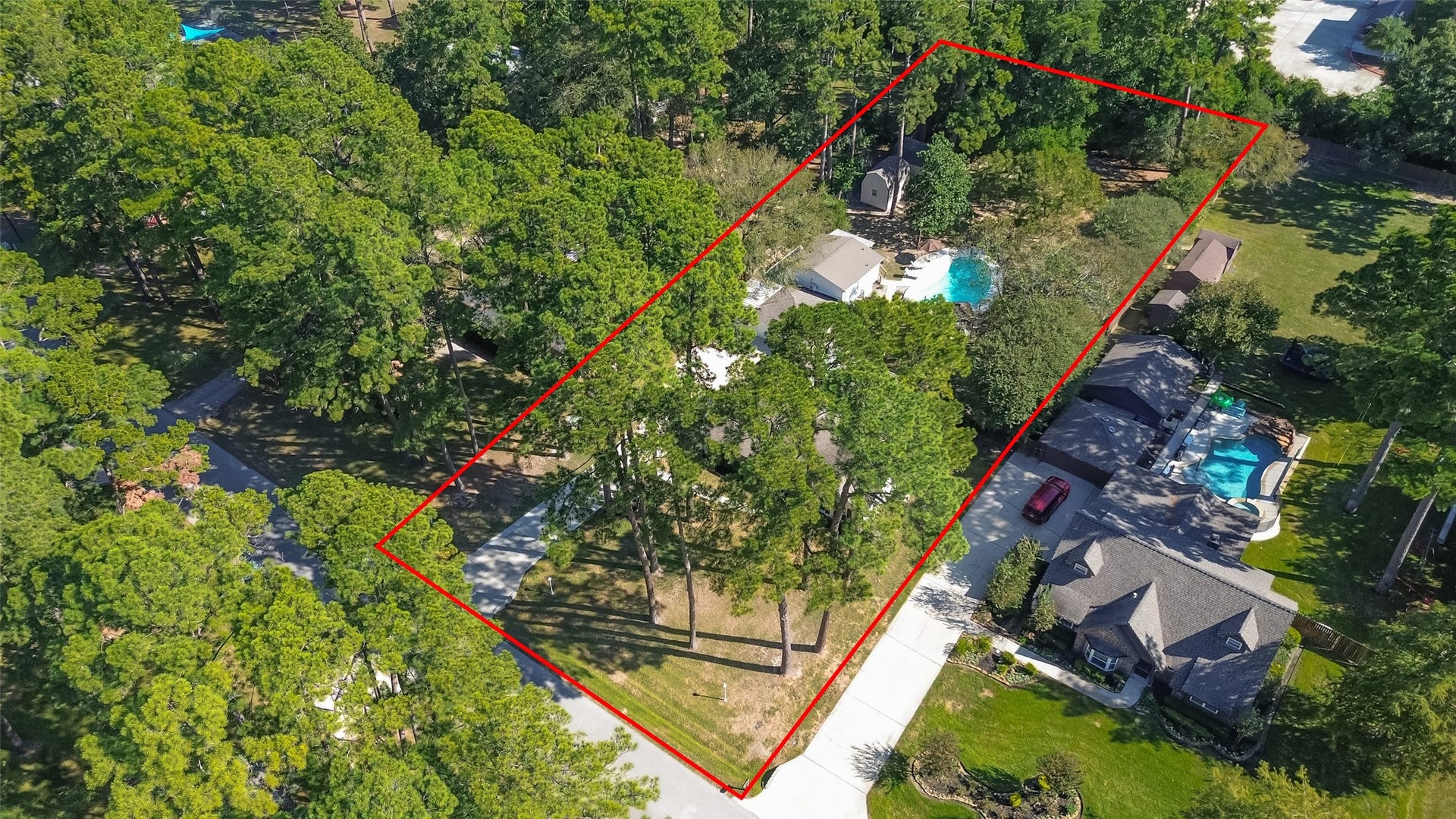 1535 Memorial Drive, Conroe, TX 77304 THE RED LINE IS SHOWING THE APPROXIMATELY BOUNDARY LINE AND SIZE OF THE PROPERTY. A SURVEY IS AVAILABLE.