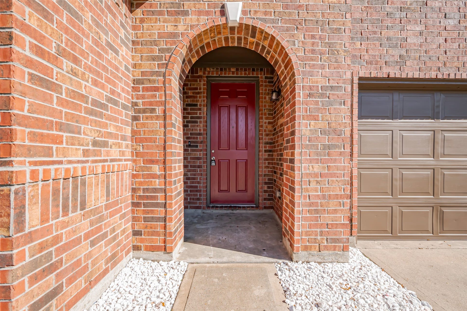 24114 Morrison Lane, Katy, TX 77493 Entrance arched with brick exterior.