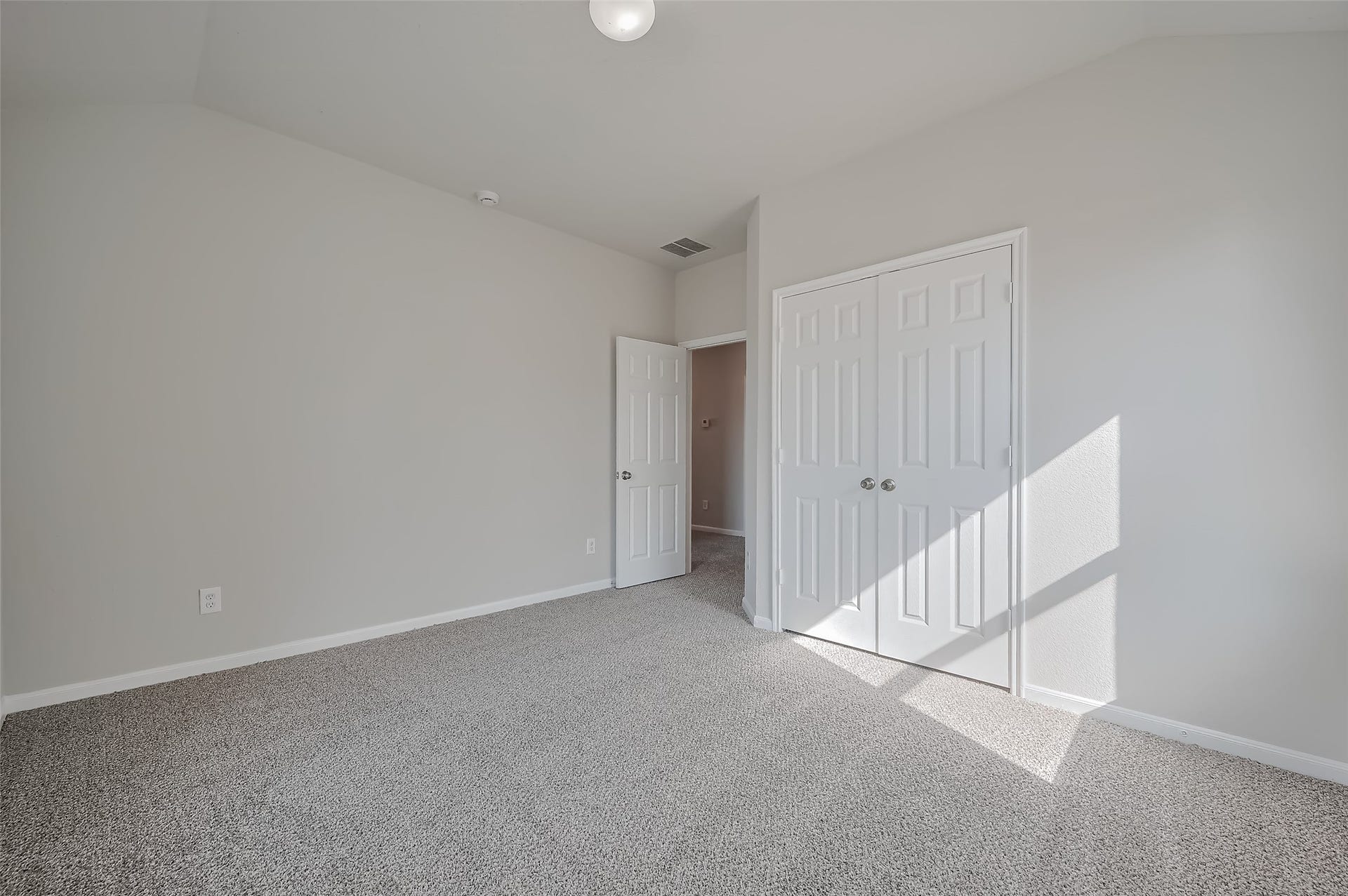 24114 Morrison Lane, Katy, TX 77493 Bedroom with double-door closet and hallway access.