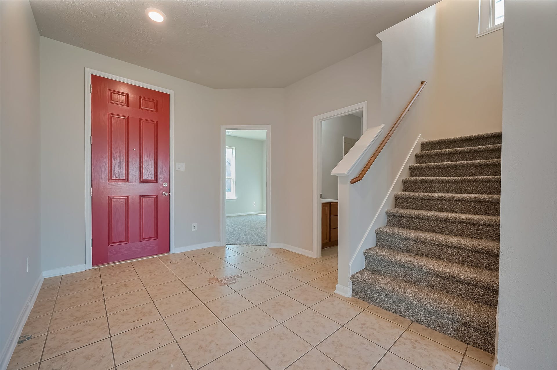 24114 Morrison Lane, Katy, TX 77493 Entryway featuring bold red door.