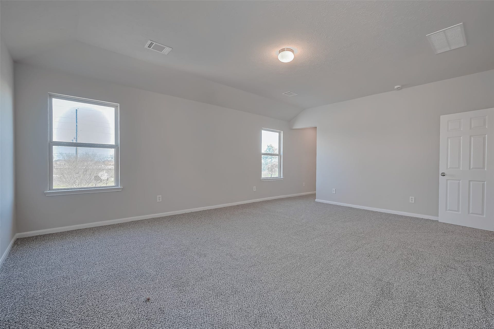 24114 Morrison Lane, Katy, TX 77493 Bedroom boasts neutral walls and plush carpeting.