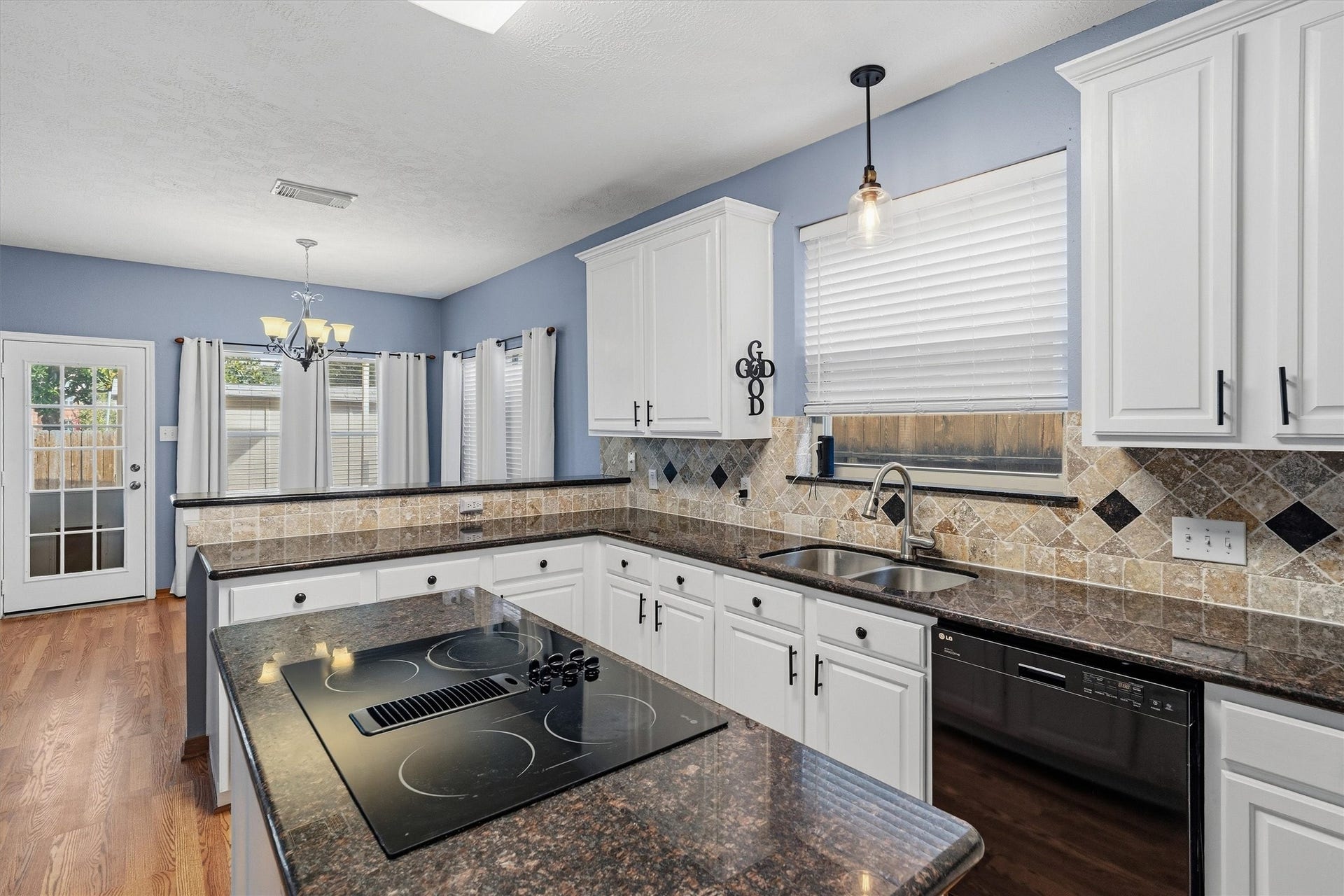 1107 Elmgrove Park Lane, Seabrook, TX 77586 A cooks dream with this roomy kitchen for cooking and hanging out with your family and guests