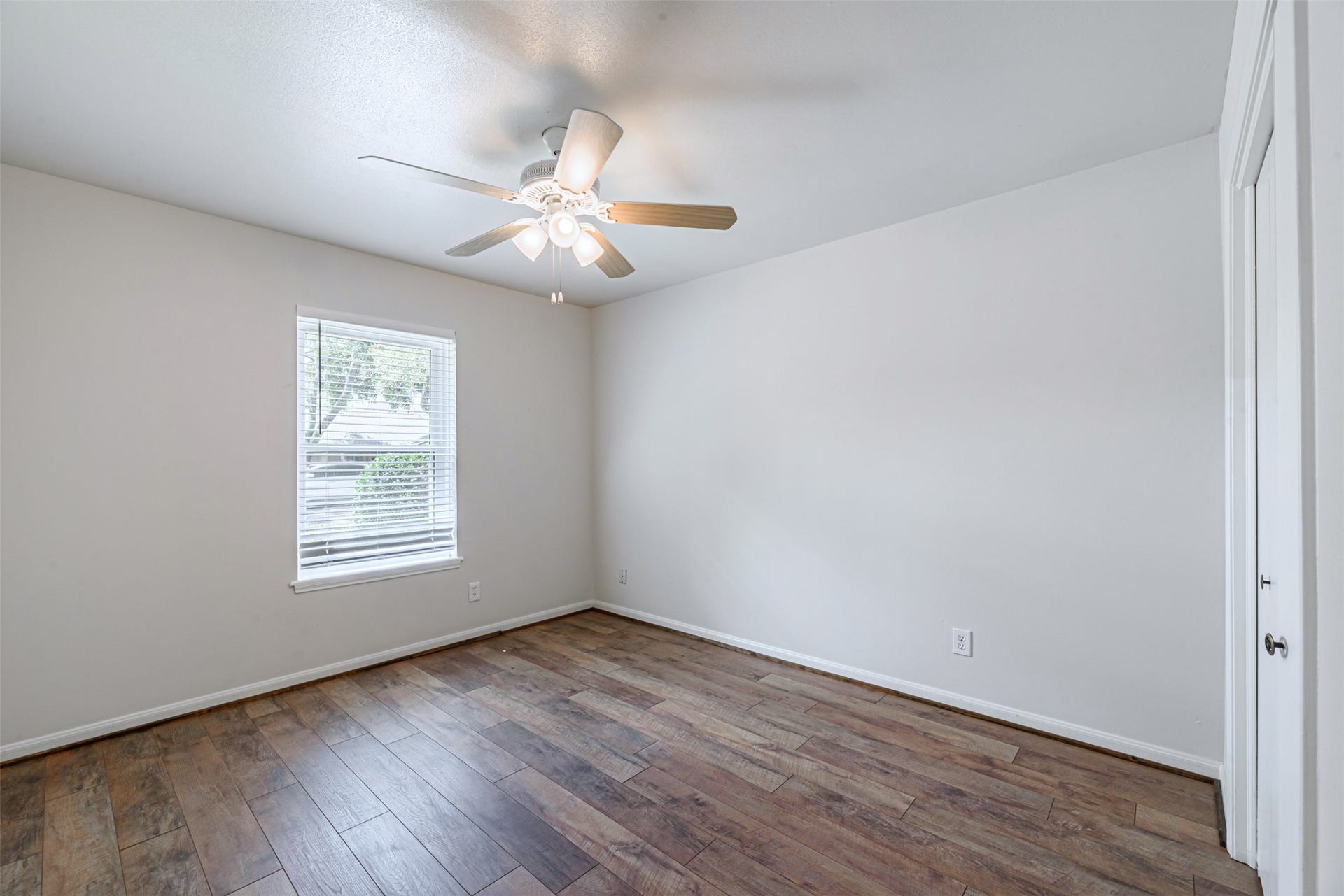 124 Dogwood Street, Sugar Land, TX 77478 Second Bedroom, newly installed fans to keep all areas cool.