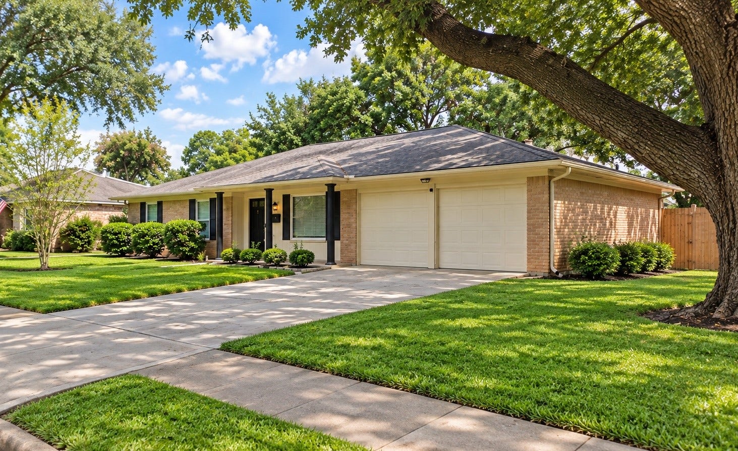 124 Dogwood Street, Sugar Land, TX 77478 Charming home enveloped by lush greenery, capturing the essence of its vibrant neighborhood.