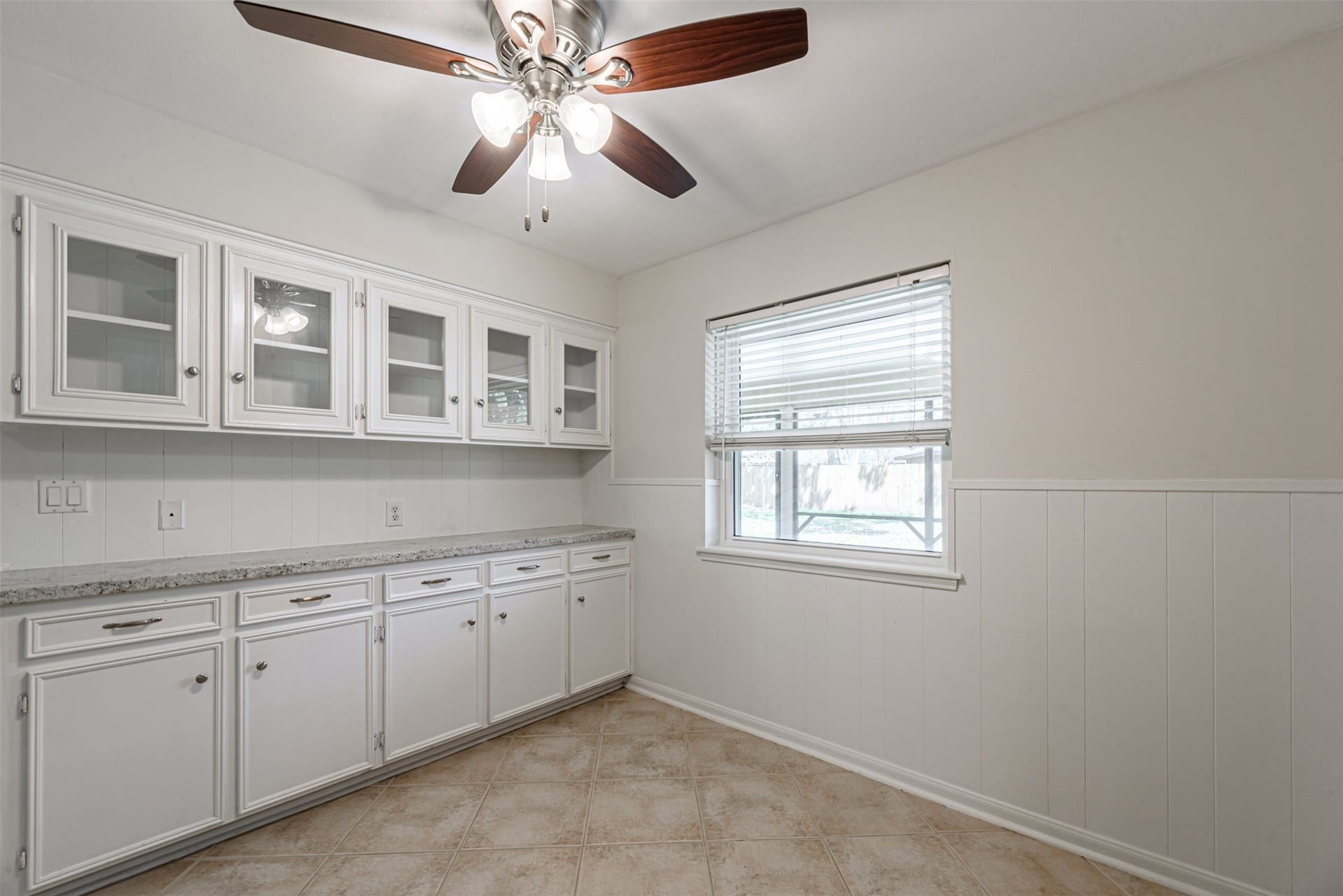 124 Dogwood Street, Sugar Land, TX 77478 In the kitchen, this corner is the perfect place for a large dining table. There is no shortage of cabinets in this area to organize pots, pans and the dinnerware, so convenient.