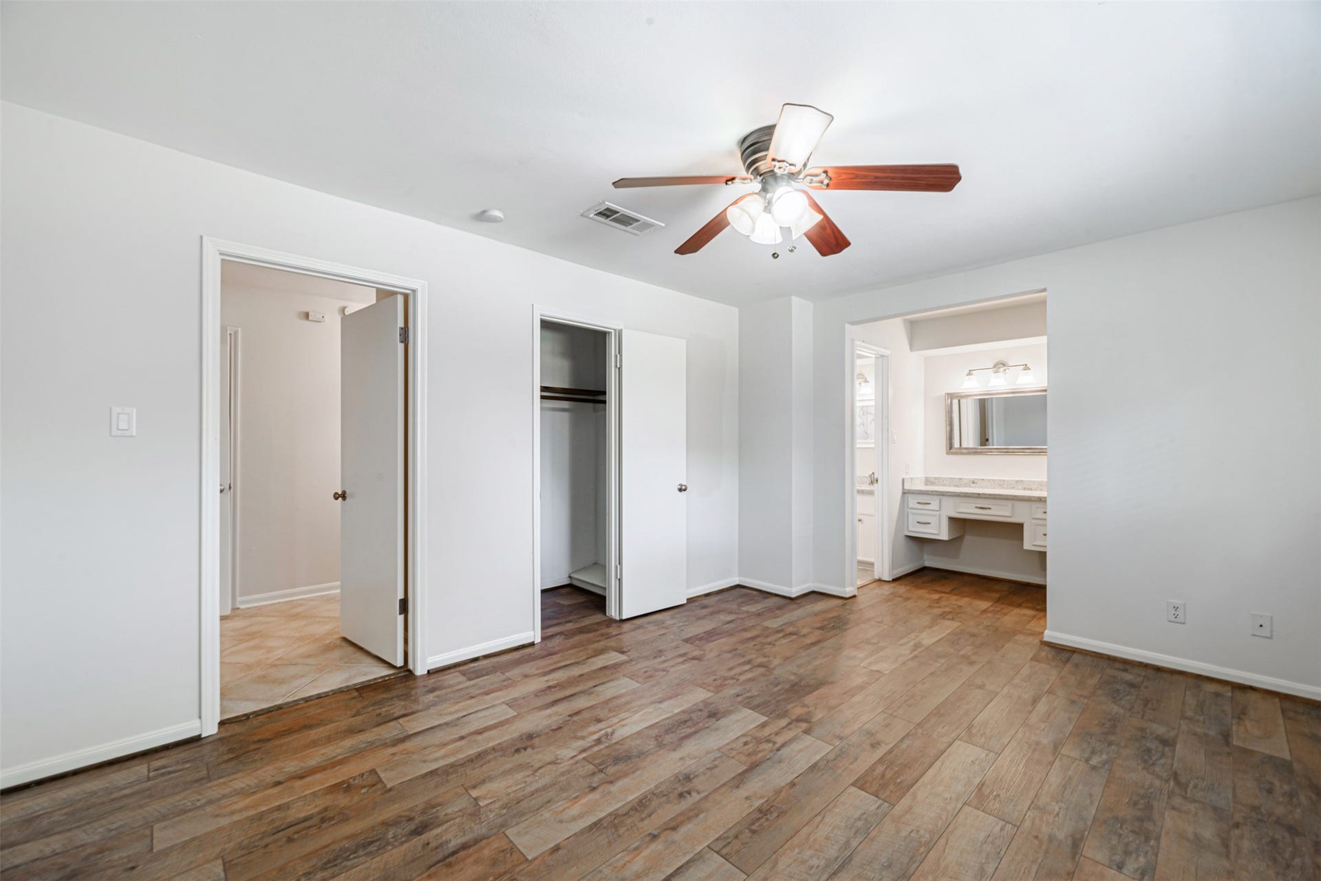 124 Dogwood Street, Sugar Land, TX 77478 The master bedroom has a double closet and the separate vanity from the shower offers desirable privacy.