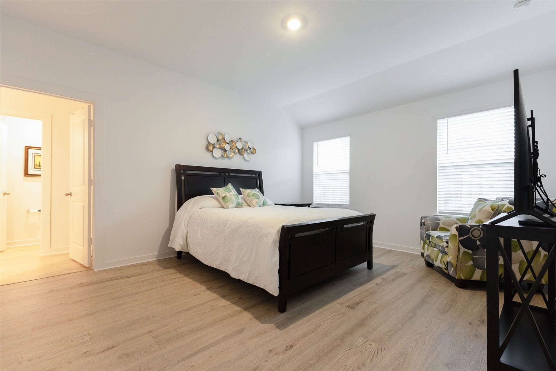 30502 White Cliff Court, Fulshear, TX 77441 Spacious primary bedroom and abundant natural light from two large windows.