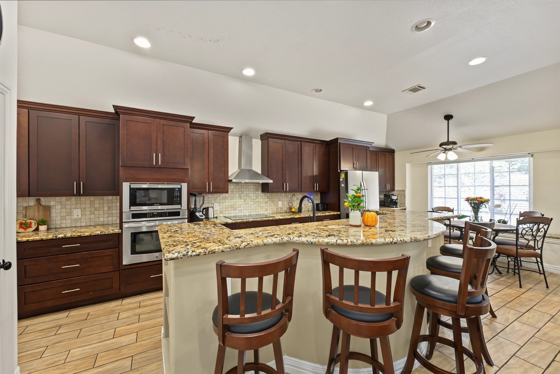 Breakfast bar with granite countertop