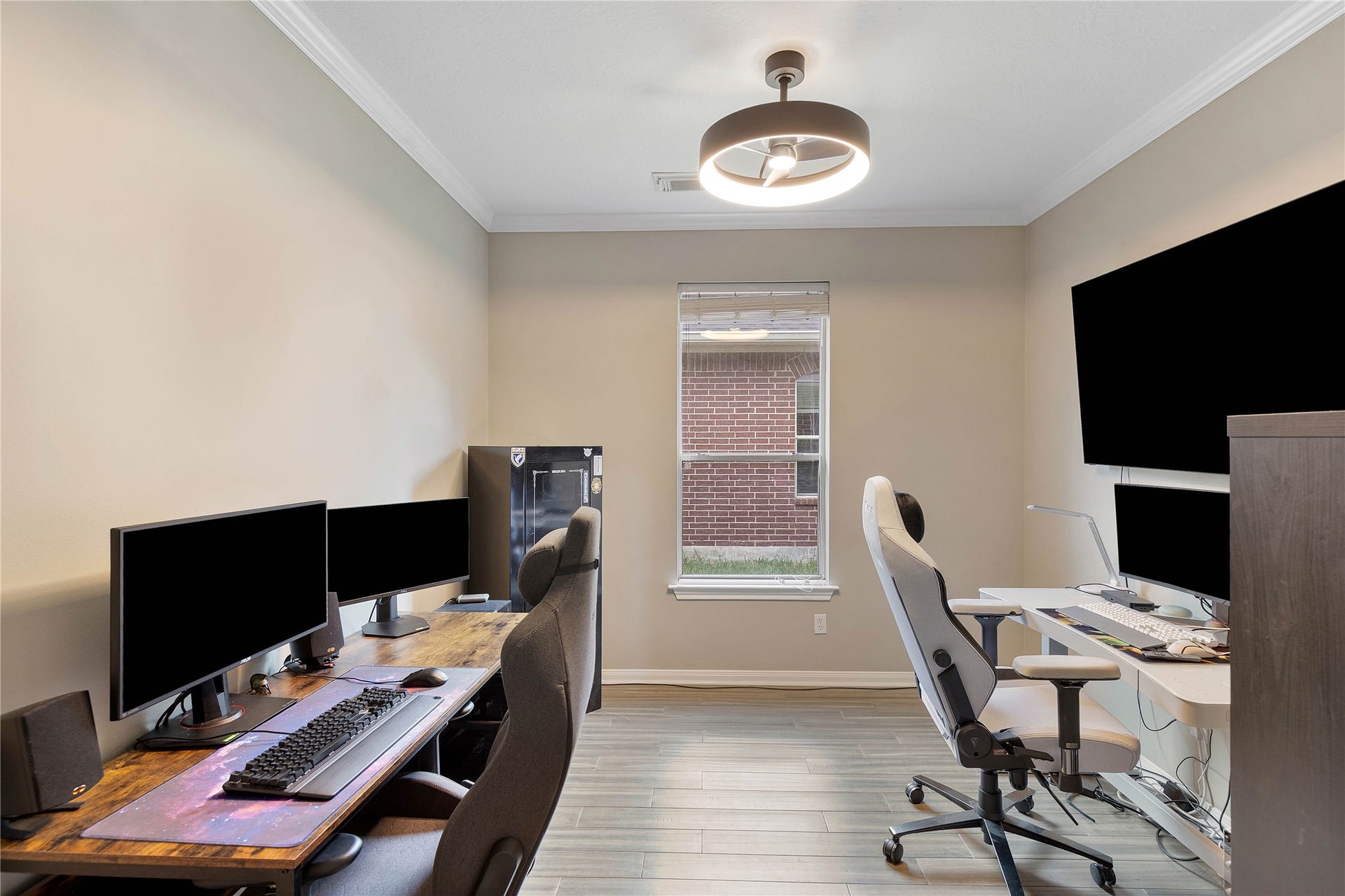 18343 Otter Creek Trail, Humble, TX 77346 Elevate your productivity in this sleek, modern office space, featuring ample room for dual workstations and abundant natural light.