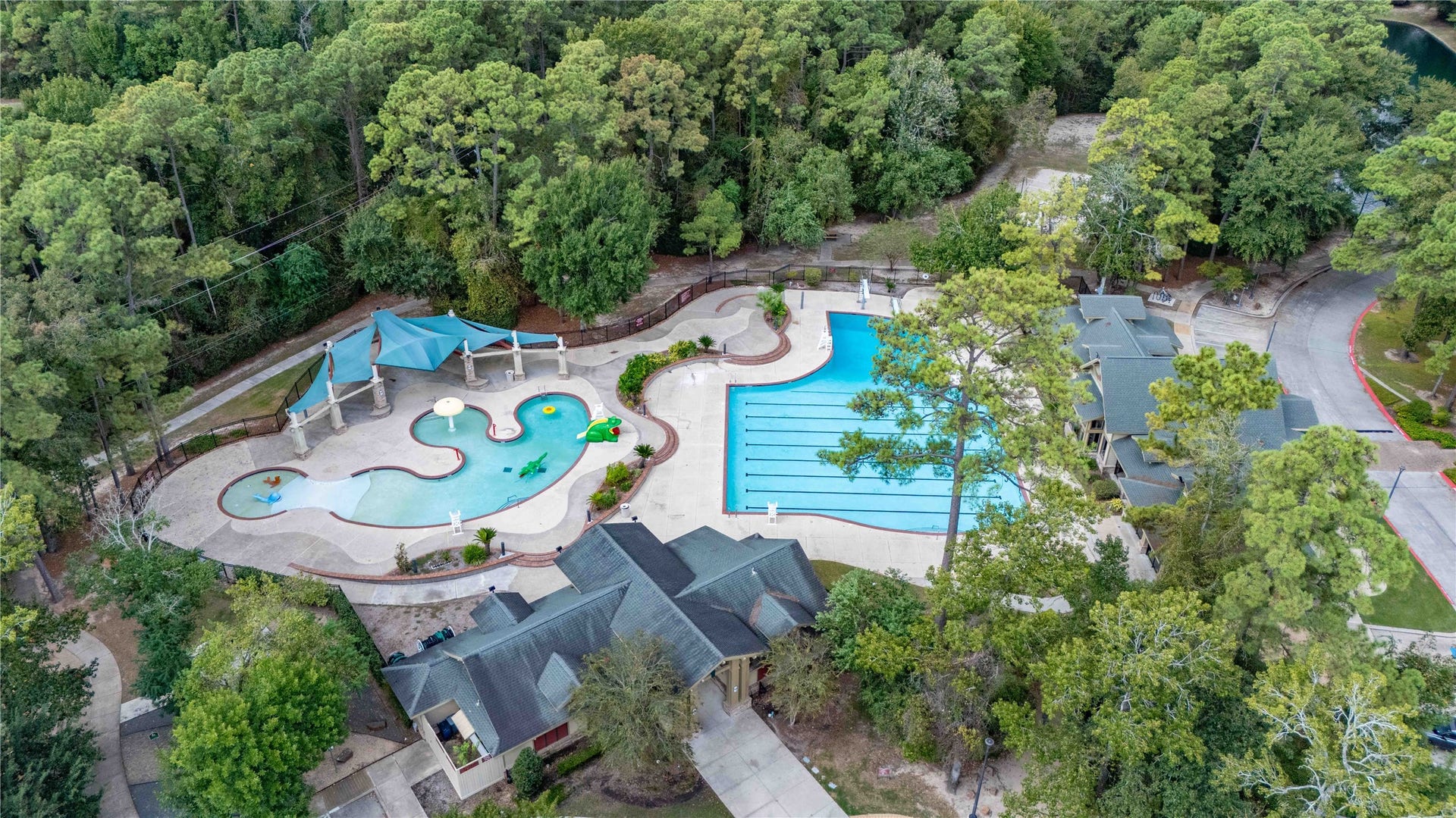 18343 Otter Creek Trail, Humble, TX 77346 Enjoy an active lifestyle with these fantastic community amenities, featuring a sparkling pool and lush surroundings perfect for relaxation and recreation.