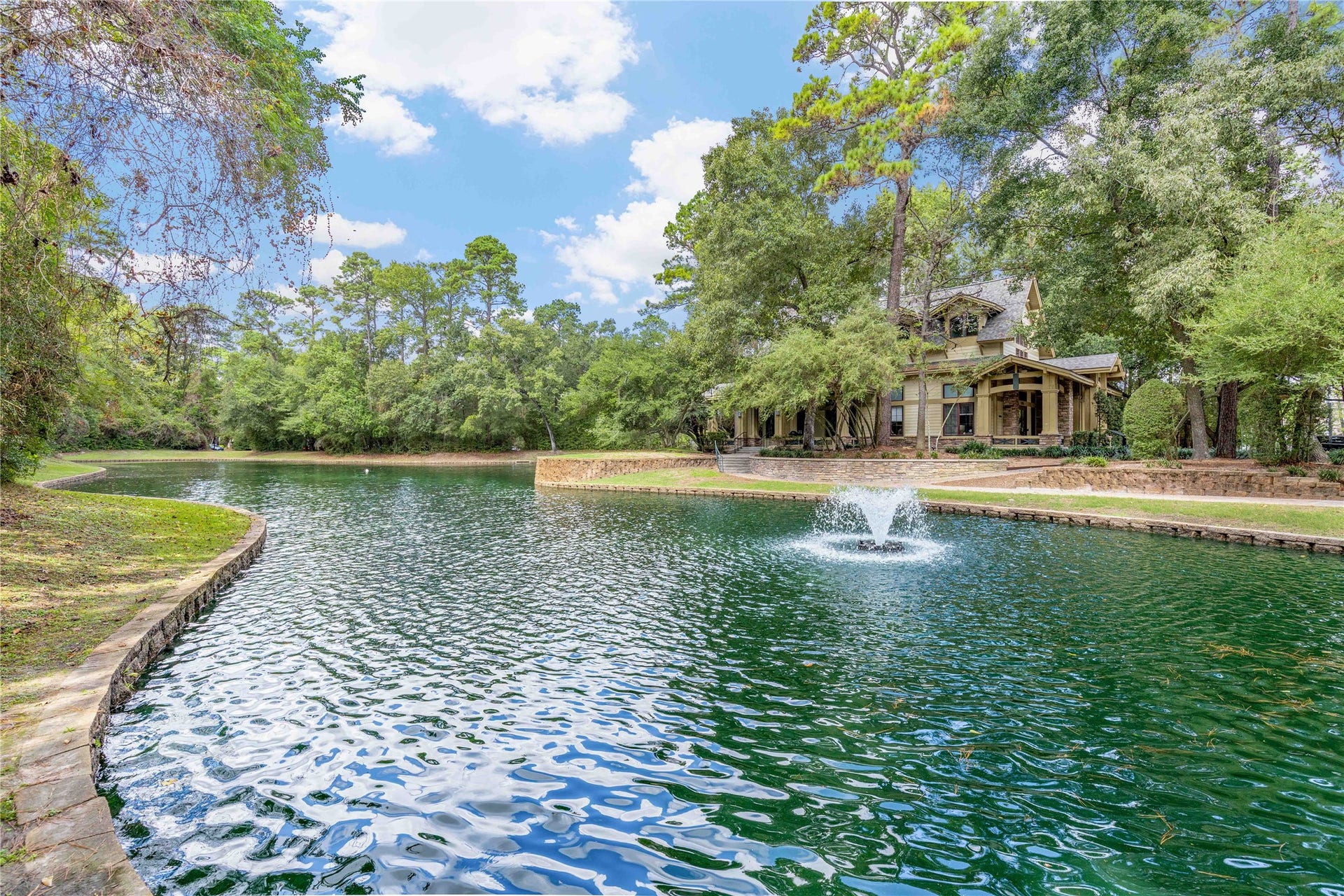 18343 Otter Creek Trail, Humble, TX 77346 Experience tranquil living with scenic pond views and access to exceptional community amenities.