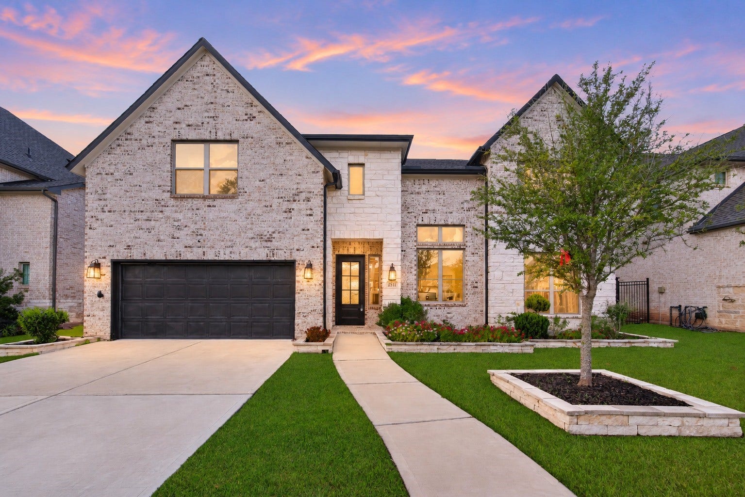 2511 Falling Fig Lane, Richmond, TX 77406 Experience refined lakefront luxury in this exceptional Westin Homes Carter IX, showcasing an elegant brick and stone elevation, 5 bedrooms, 4.5 baths, and a premium 60-ft lot with serene water views and NO BACK NEIGHBORS
