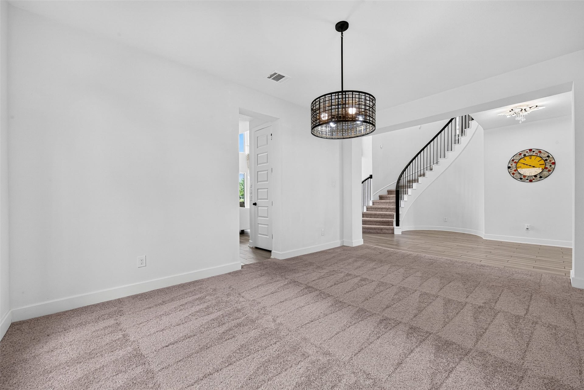 2511 Falling Fig Lane, Richmond, TX 77406 An exquisite formal dining room showcasing timeless elegance and refined sophistication, offering an impressive setting for upscale entertaining and memorable gatherings.