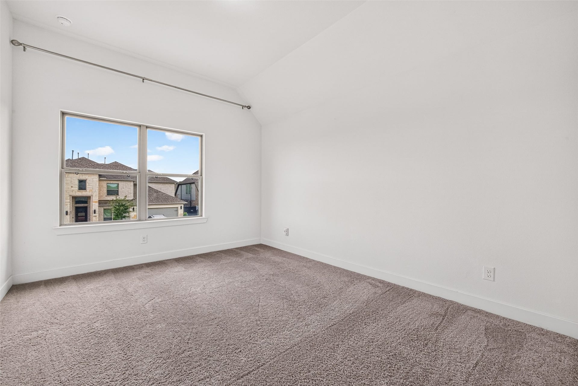 2511 Falling Fig Lane, Richmond, TX 77406 The second-floor secondary bedroom #3 offers a private, well-appointed retreat, complete with its own en-suite bath for a seamless blend of comfort, independence, and everyday convenience