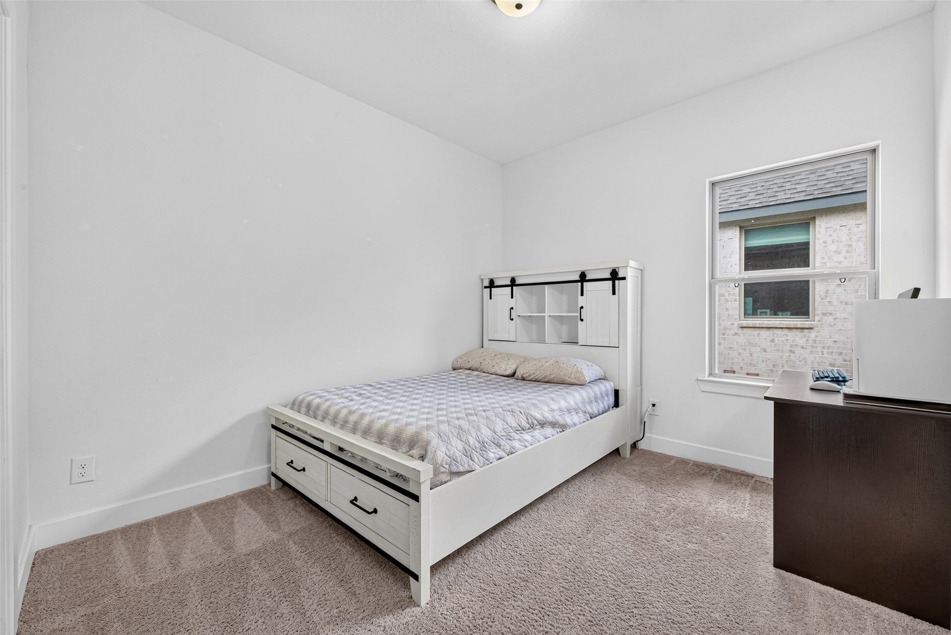 2511 Falling Fig Lane, Richmond, TX 77406 Second-floor Secondary Bedroom #1 offers a private and inviting retreat with convenient bathroom access, thoughtfully designed to provide comfort, flexibility, and a touch of everyday luxury