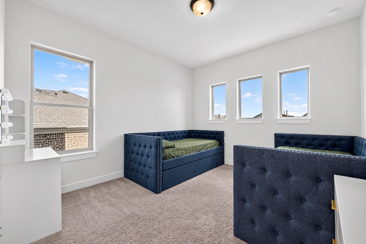 2511 Falling Fig Lane, Richmond, TX 77406 Second-floor Secondary Bedroom #2 offers a versatile and bright inviting space with convenient bathroom access, providing comfort and flexibility for everyday living