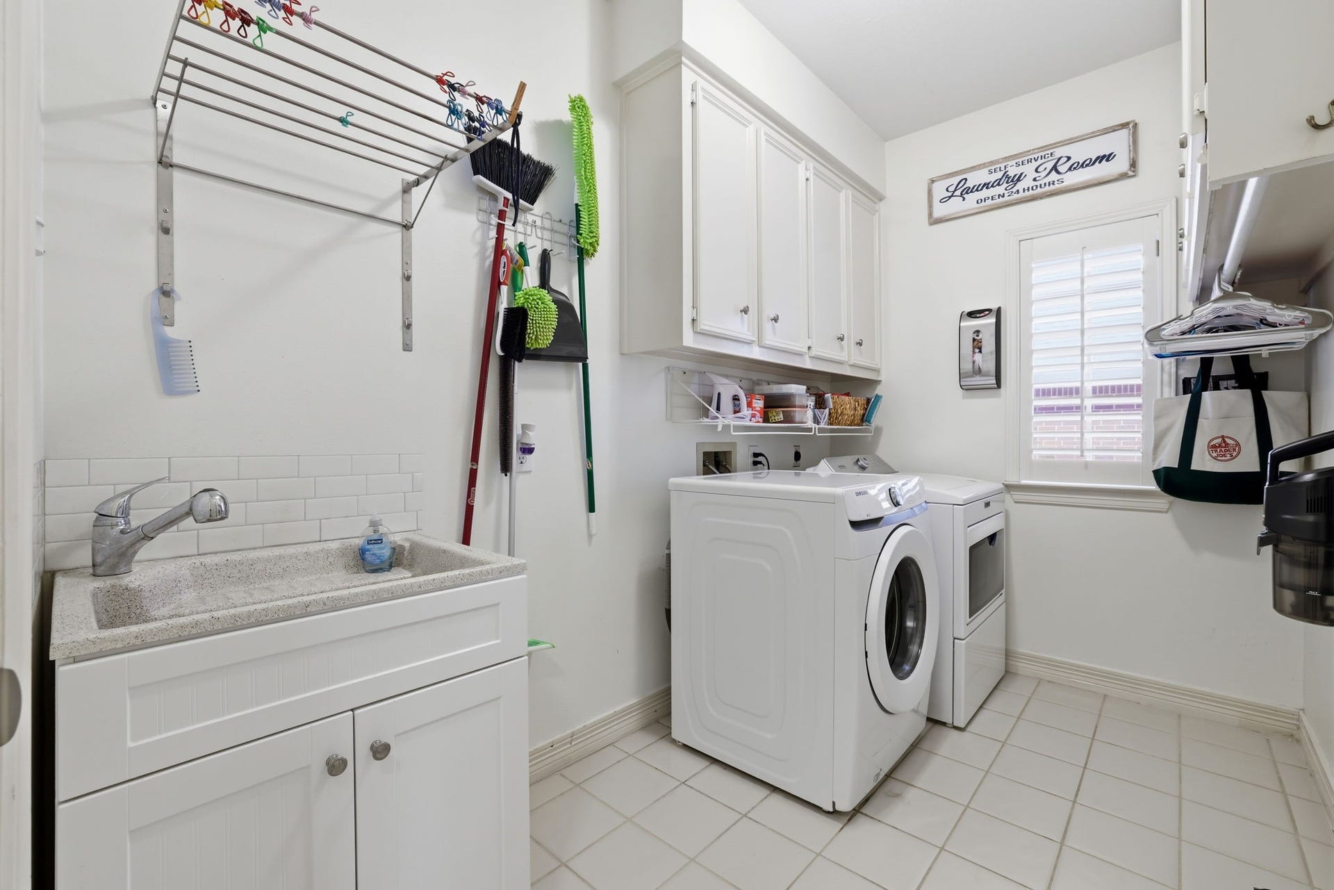 4519 Castlewood Street, Sugar Land, TX 77479 Big utility room with a window and a great sink