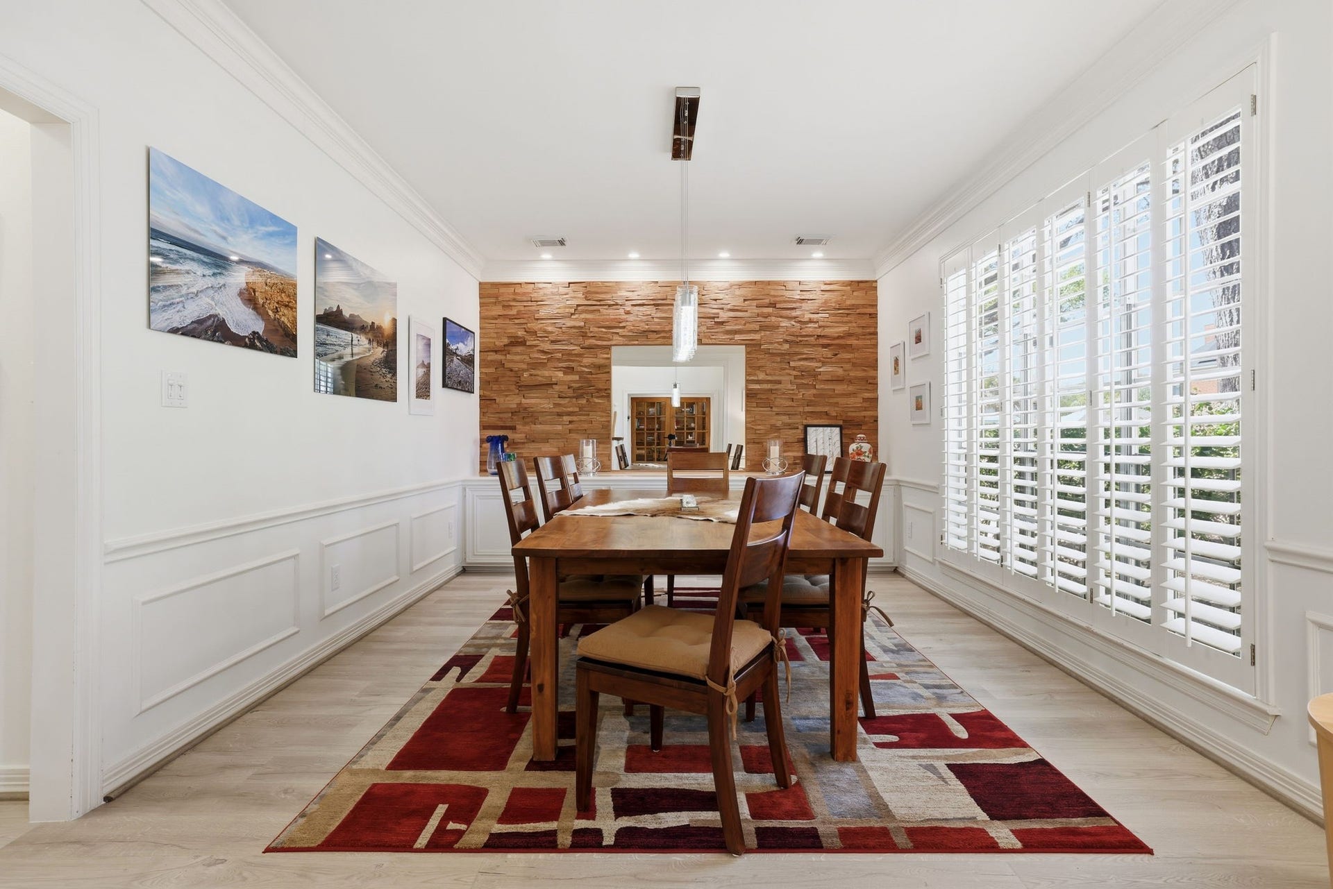 4519 Castlewood Street, Sugar Land, TX 77479 Formal Dining Room with detailed woodwork, built cabinets and six gorgeous windows!