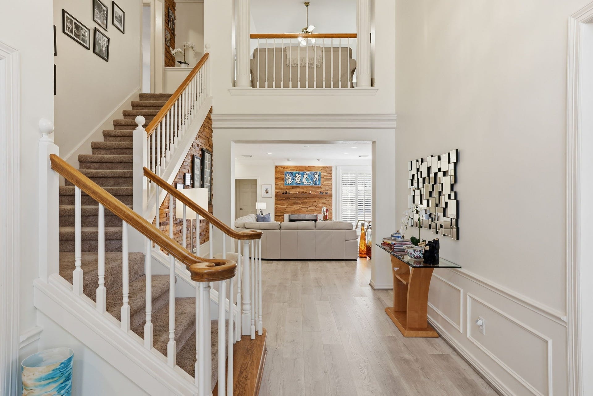 4519 Castlewood Street, Sugar Land, TX 77479 throughout the entire downstairs, you will notice this high quality, thick Timbercraft waterproof 12mm Pergo
