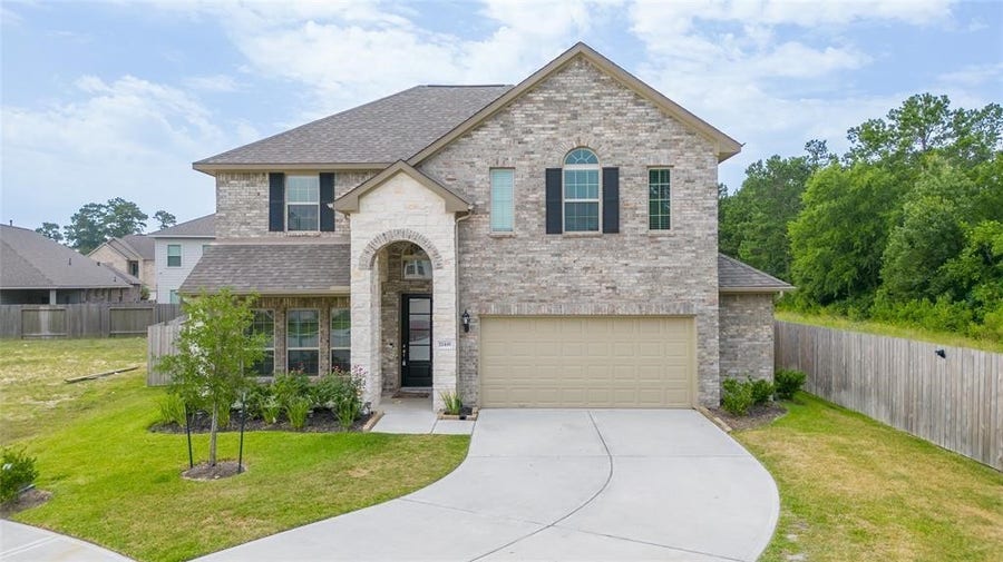 Property photo for 21449 Kings Guild Lane, Kingwood, TX