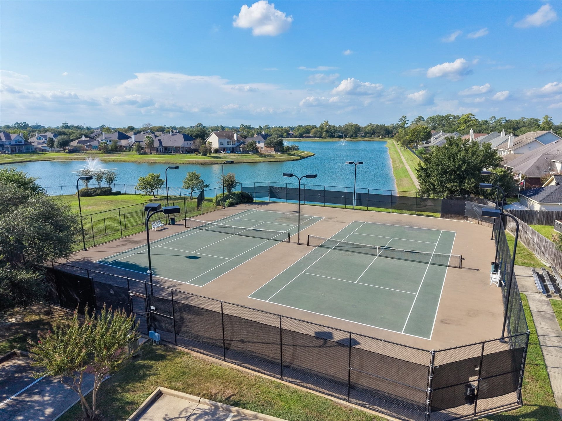 The community tennis courts are available for all neighbors and can even be used for Pickleball.