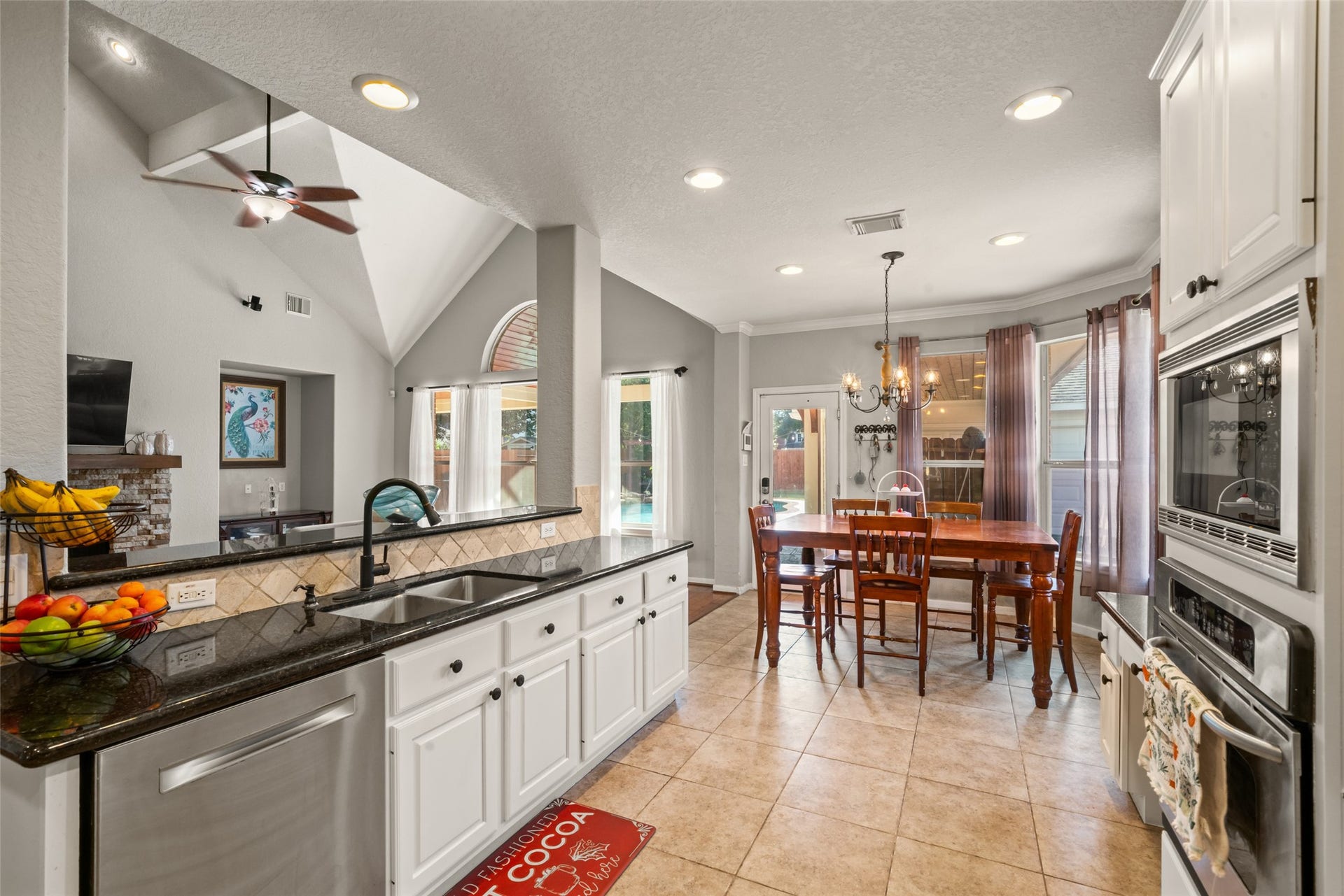 The open kitchen is designed for amazing meals while entertaining guests.