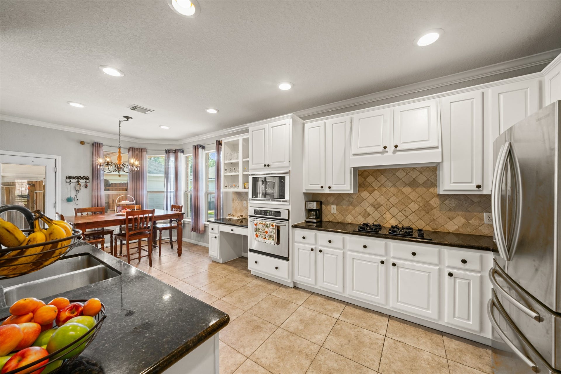 Generous cabinetry and plenty of counter space suitable for everyday living.